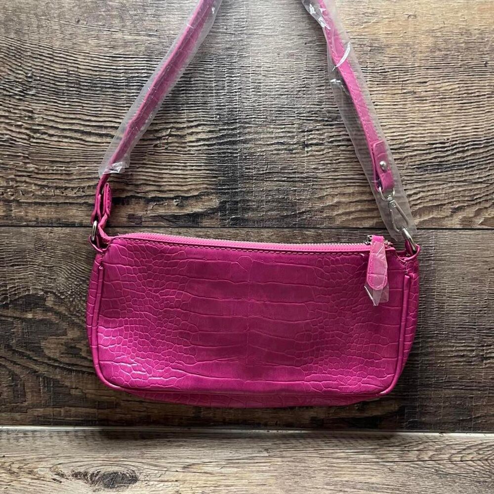 Pink crocodile textured faux leather bag